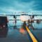 airplane-awaiting-service-at-airport-terminal