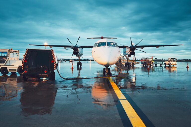 airplane-awaiting-service-at-airport-terminal