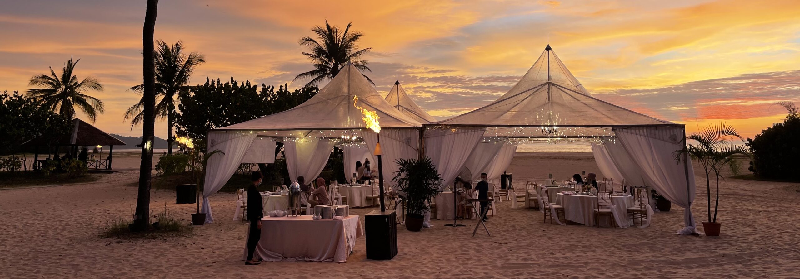 beach-wedding-reception-at-sunset-under-tented-can-2026-09-22-01-11-38-utc_cr beach wedding reception at sunset under tented can 2026 09 22 01 11 38 utc cr scaled