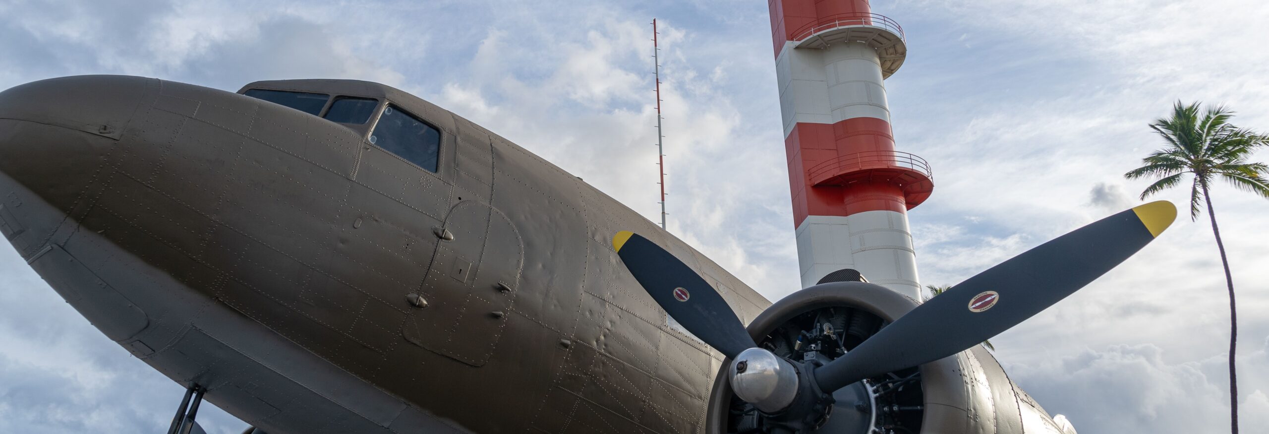 Vintage aircraft and control tower