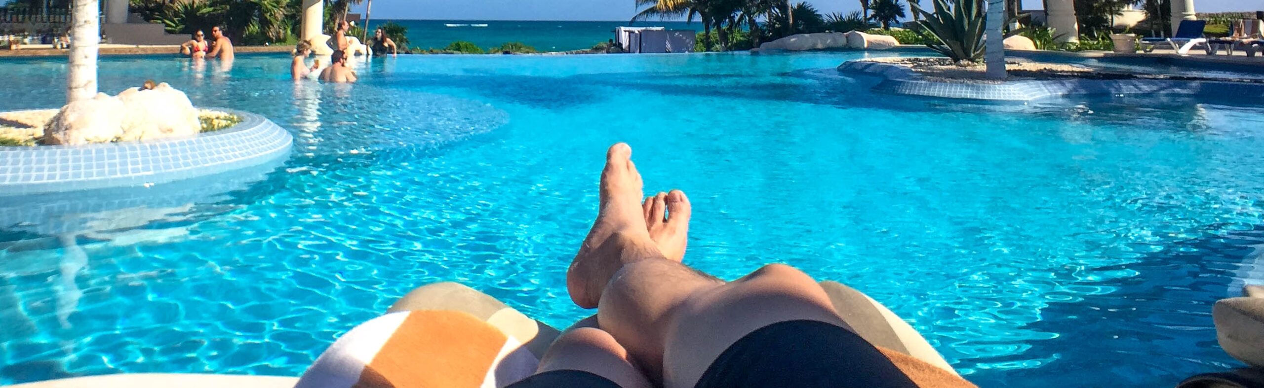 pool-side-relaxing-vacation-in-tulum-mexico-2026-09-23-05-19-36-utc_cr pool side relaxing vacation in tulum mexico 2026 09 23 05 19 36 utc cr scaled
