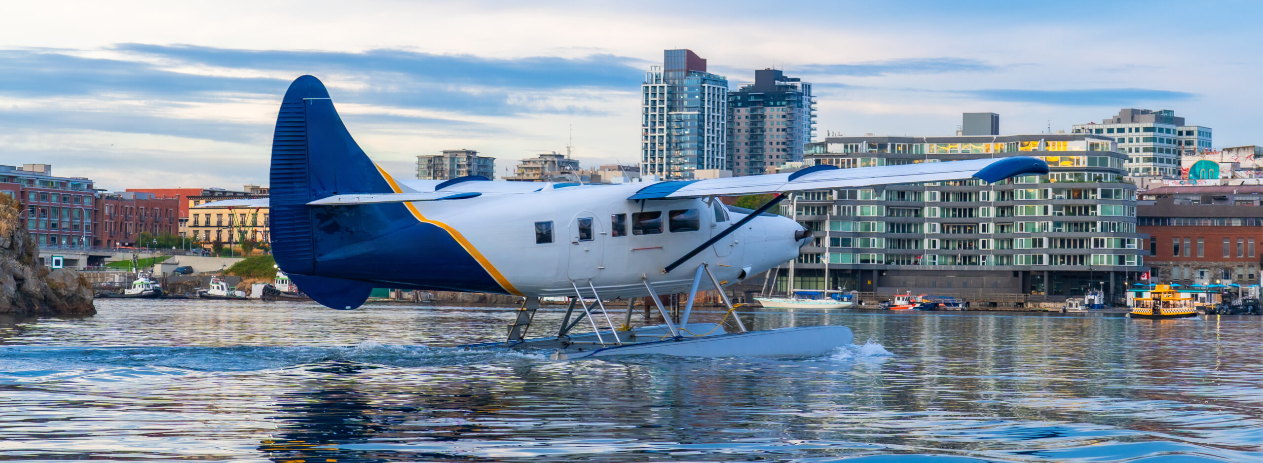 Seaplane landing in victoria harbor, british columbia, canada