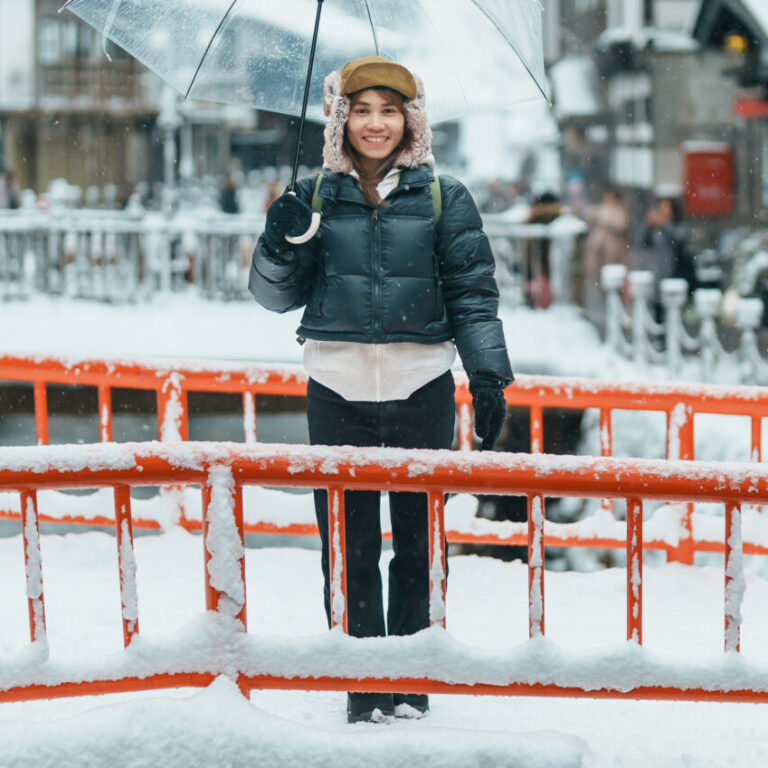Woman tourist Visiting Ginzan Onsen in Yamagata